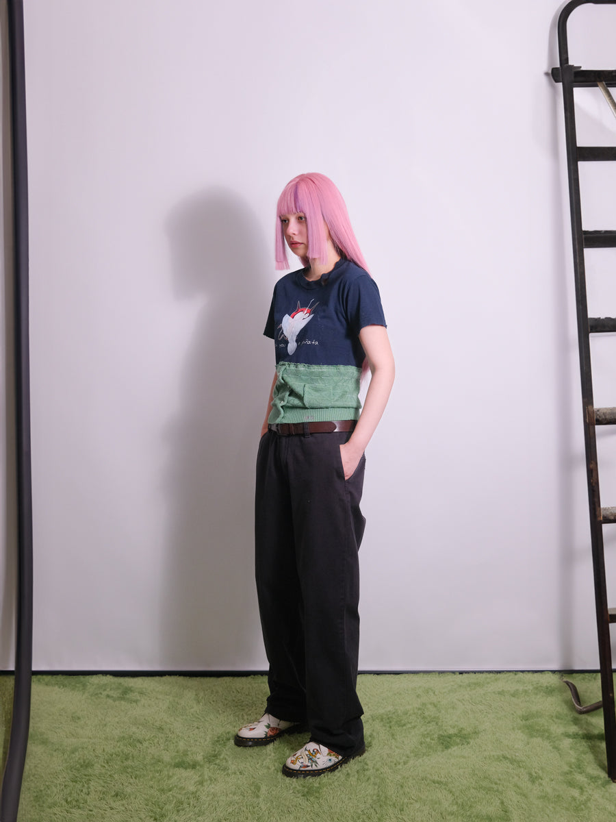 Side view of upcycled top with paneled construction and distressed finish