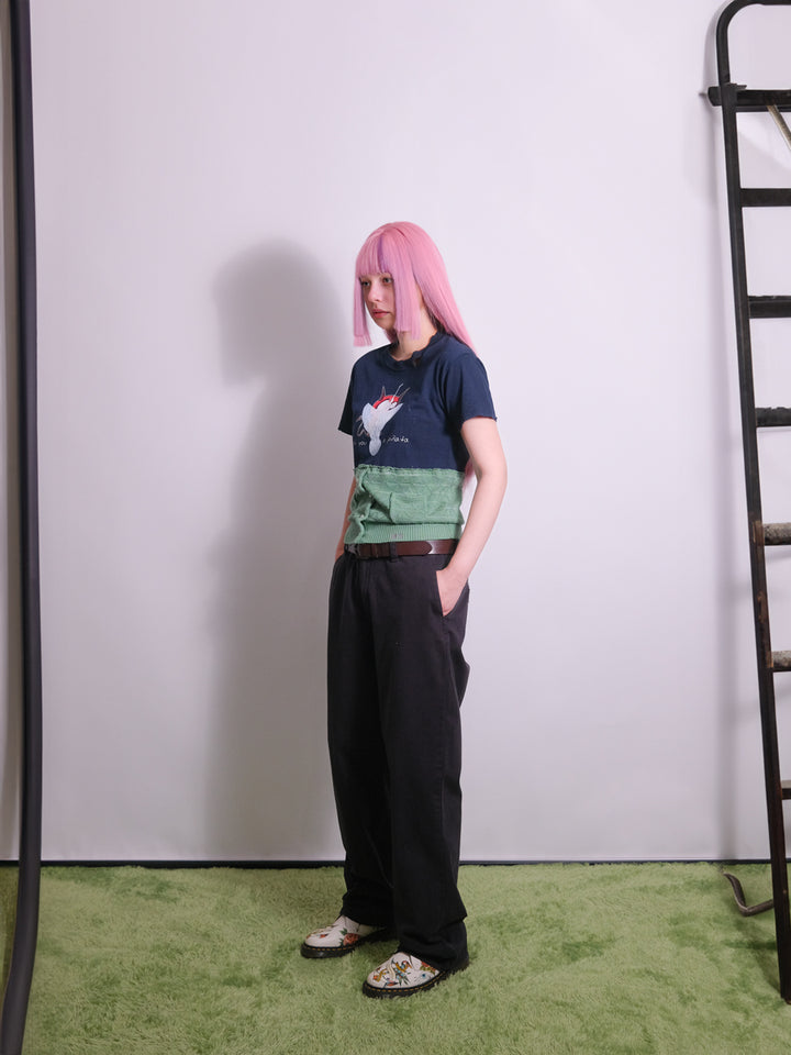 Side view of upcycled top with paneled construction and distressed finish